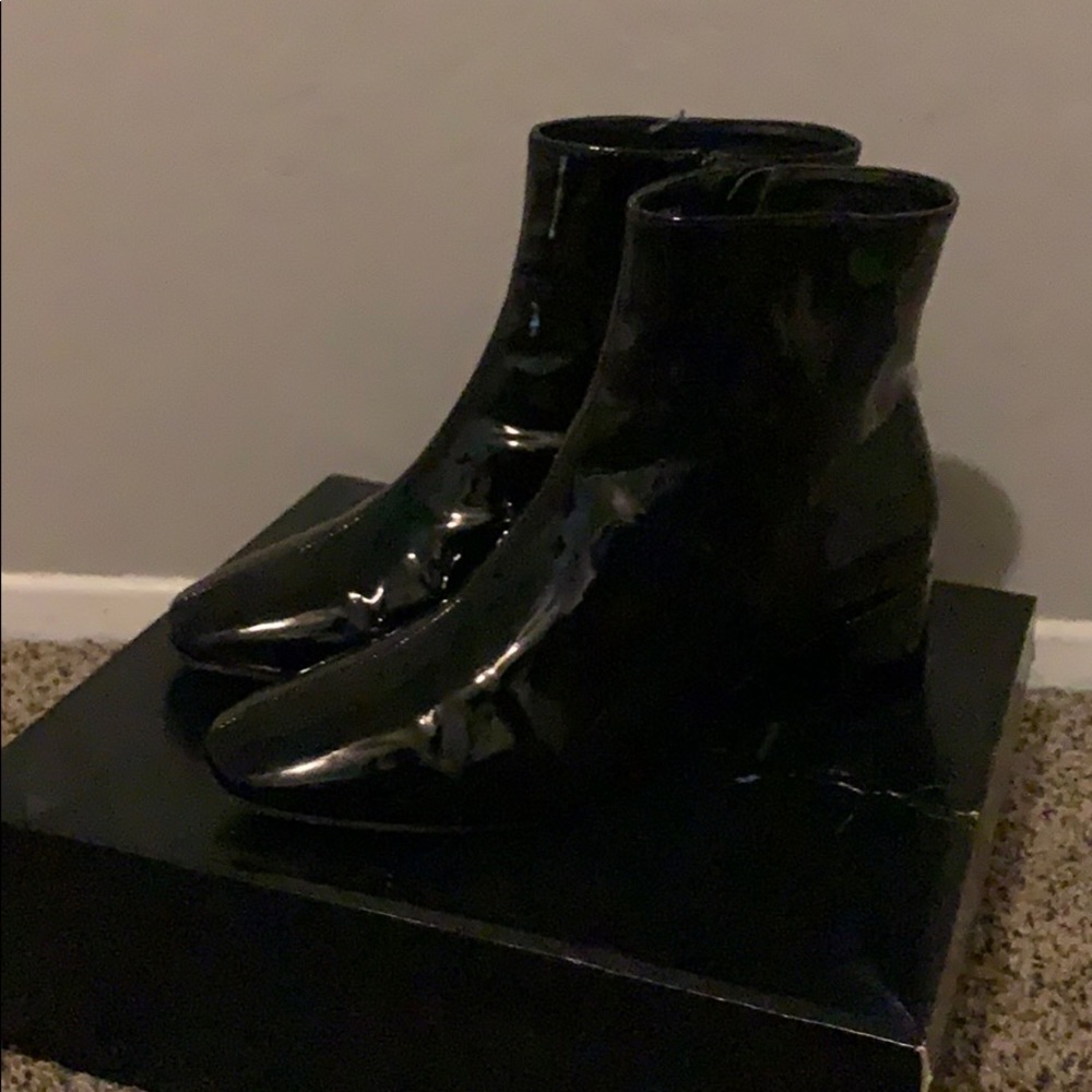 Black to the ankle patent boots